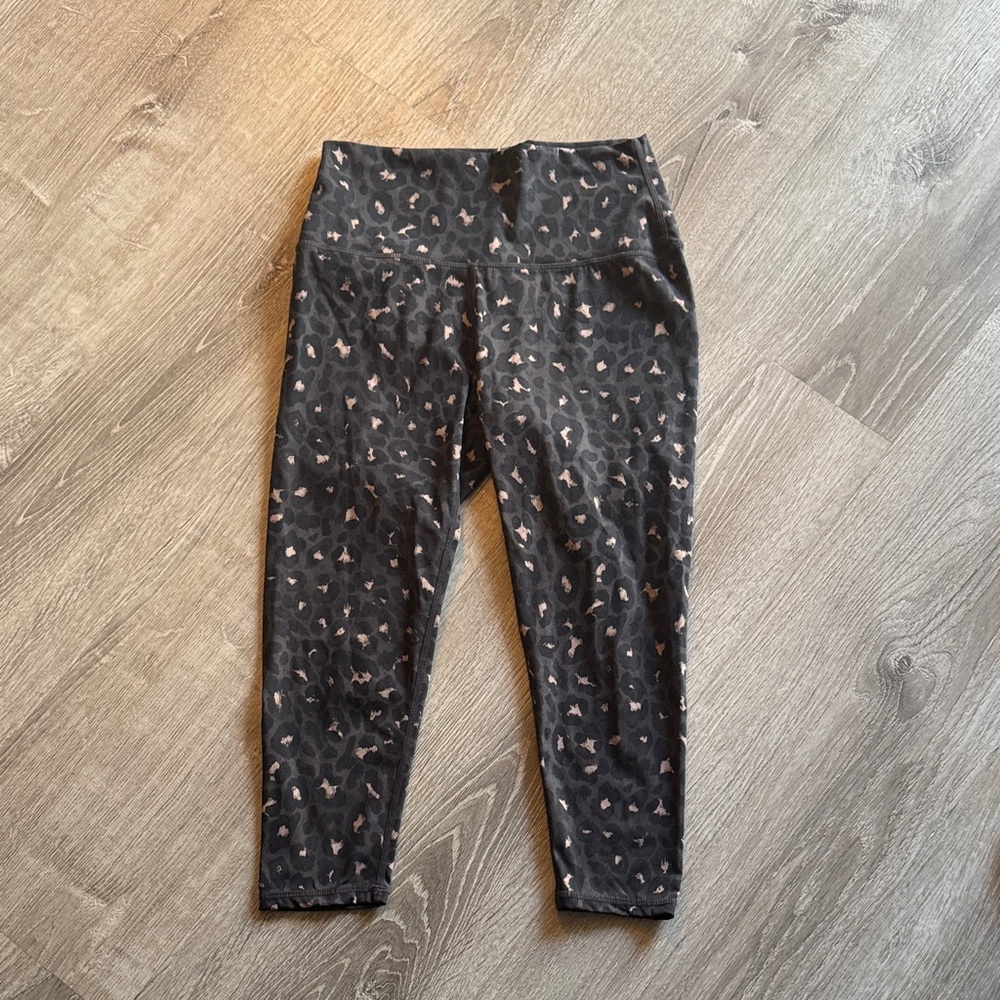 Varley Black and Pink cropped workout leggings.